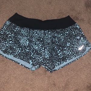 Women’s black and blue patterned nike shorts